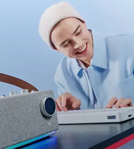 Music enthusiast creating music with the PartyKeys smart keyboard
