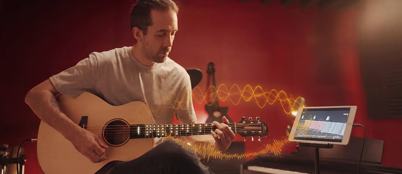 A beginner is using Poputar to practice guitar techniques